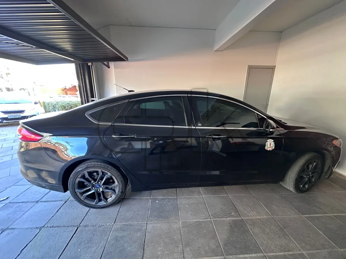LOTE 003 - FORD Fusion SEL GTDI Passageiro – Automóvel Gasolina  2018/2018 – Placas IYM 9J24 – Cor: Preta.