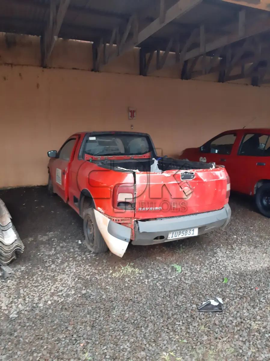 LOTE 001 - Marca Volkswagen Modelo Nova Saveiro CS 1.6 Renavan  00558502601, Placa IUP5B31 Chassi 9BWKB05UXEP053534  Ano/Mod 2013/2014, Motor 4 Cilindros, 8 válvulas  Potência 104  CV, cor vermelha.