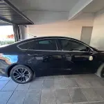 LOTE 003 - FORD Fusion SEL GTDI Passageiro – Automóvel Gasolina  2018/2018 – Placas IYM 9J24 – Cor: Preta.